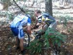 A 13th place finisher overall in The Assault on Mt. Mitchell deigns to assist a mere mortal with his obliterated tube.